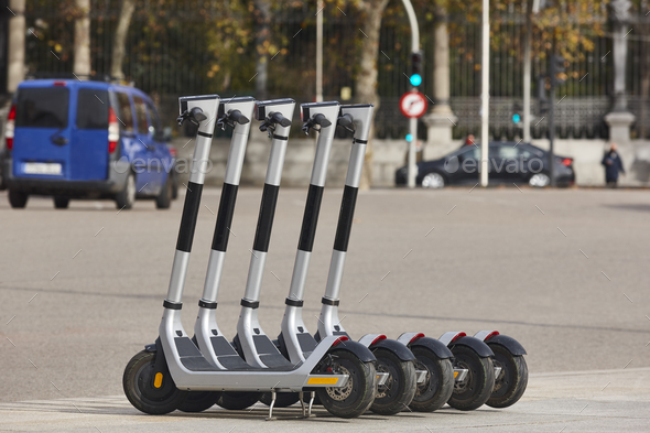 Electric scooters in the city. Urban mobility, sustainable lifestyle