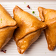 Indian sweet samosa is a Fried pastry soaked in sugar syrup filled with coconut, nuts and fruits - PhotoDune Item for Sale