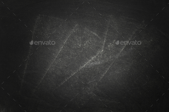 Black old empty chalkboard for copy space with colorful pieces of