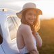 Portrait of young smiling woman standing near her car, enjoying summer time. - PhotoDune Item for Sale