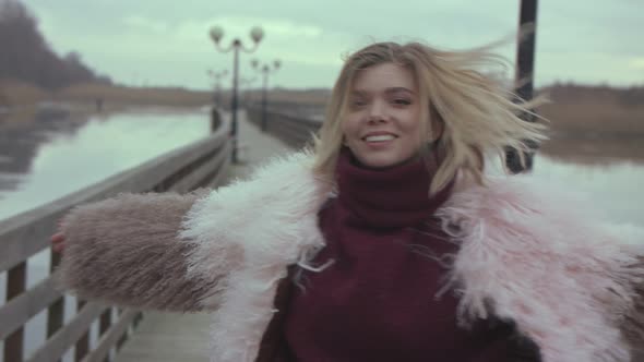 Girl Smiling and Spinning alt