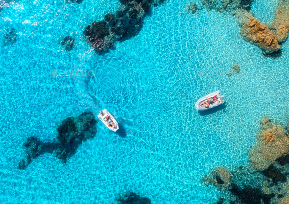 Aerial view of luxury yachts and boats on blue sea at sunny day - Stock Photo - Images
