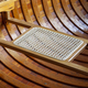 Close up interior shot of a wooden canoe and a caned seat - PhotoDune Item for Sale