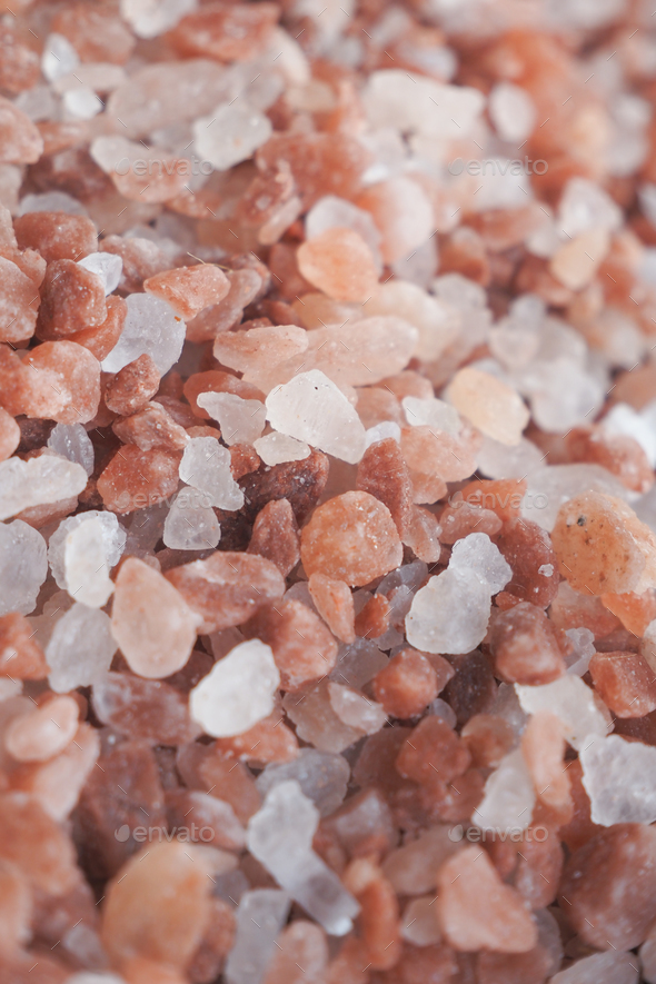 close up of pink rock salt in a bowl on table  - Stock Photo - Images