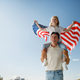 Patriotic holiday, family with American flag - PhotoDune Item for Sale