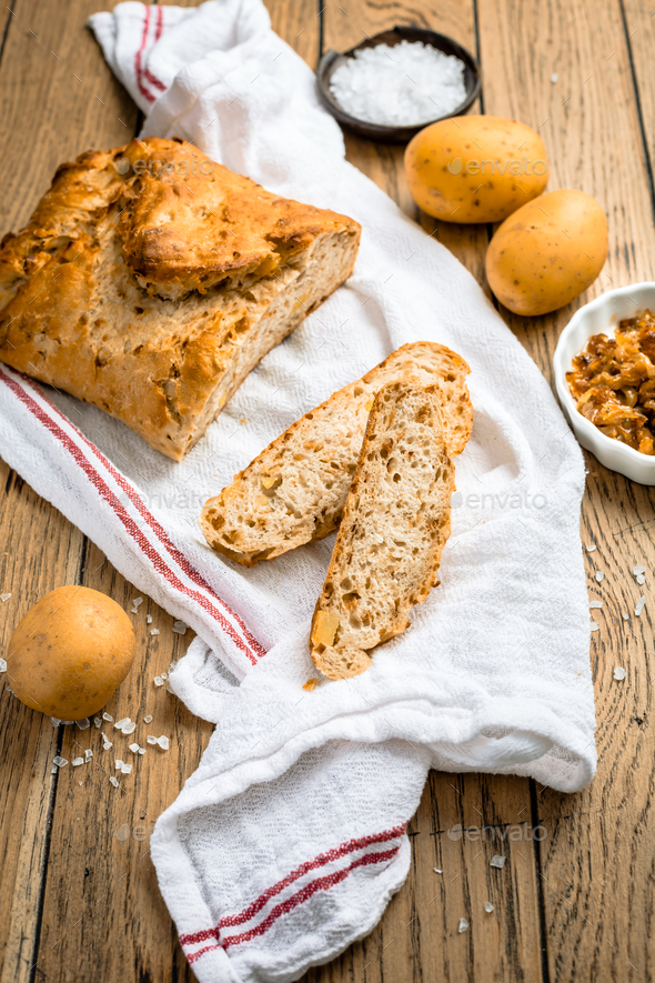 Homemade oven baked bread with carrots and onions - Stock Photo - Images
