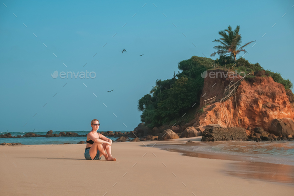 Travel. Retrit travel.Travelers woman coast ocean tropical island.wellness Solitude,wildlife,mental  - Stock Photo - Images