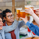 Cheerful diverse friends clinking glasses of beer - PhotoDune Item for Sale