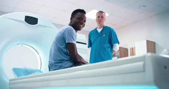Diverse Doctor and Patient in CT Lab in Clinic alt