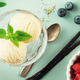 Scoops of Vanilla, mint leaves in glass bowl, sprinkles, berries and flowers  - PhotoDune Item for Sale