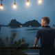 Man enjoying night view from cruise ship between islands - PhotoDune Item for Sale