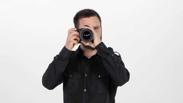 Photographer Holds the Photography alt