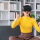 Smiling woman having fun using VR glasses playing game at home happily and enjoy virtual reality. - PhotoDune Item for Sale