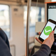 Person buying train ticket with smartphone - PhotoDune Item for Sale