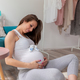 Pregnant woman enjoying leisure time at home - PhotoDune Item for Sale