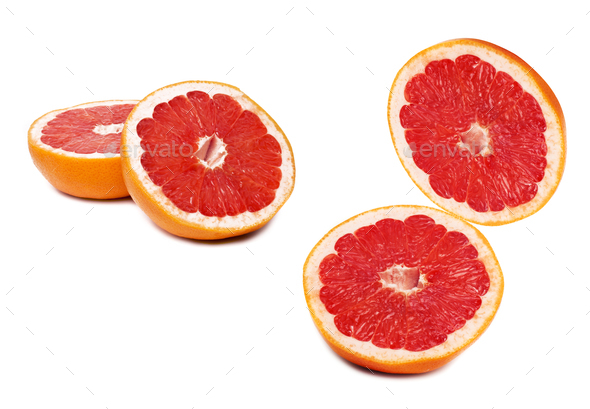 Grapefruit with slices on a white background - Stock Photo - Images