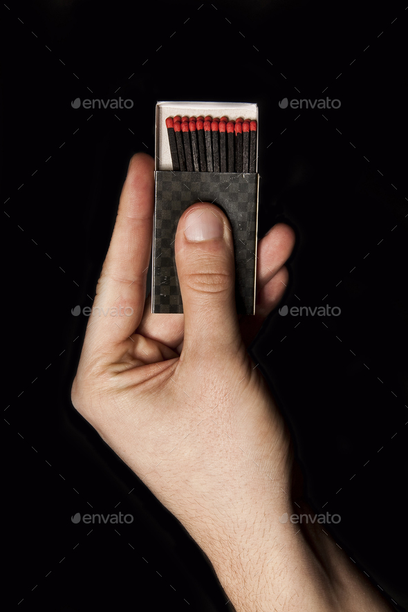 Box of matches in the man hand - Stock Photo - Images