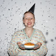 Young woman holding Birthday cake with confetti shower - PhotoDune Item for Sale