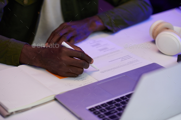 Podcaster Writing down Script - Stock Photo - Images
