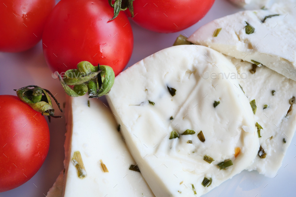 Mozzarella cheese tomatoes on plate . - Stock Photo - Images