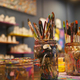Paints and paint brushes in an artists studio. - PhotoDune Item for Sale