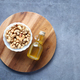 cashew nuts and oil on table  - PhotoDune Item for Sale