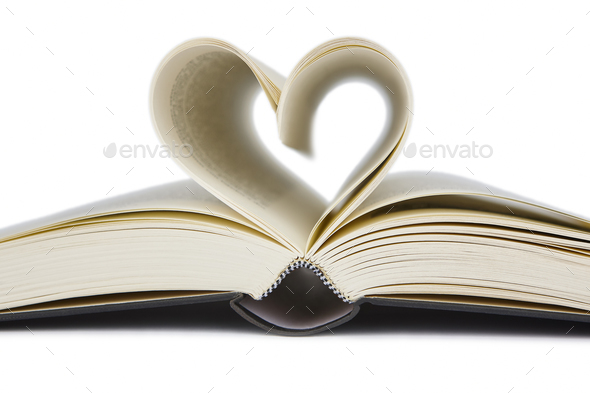 Open book with heart shaped pages. Love for reading - Stock Photo - Images