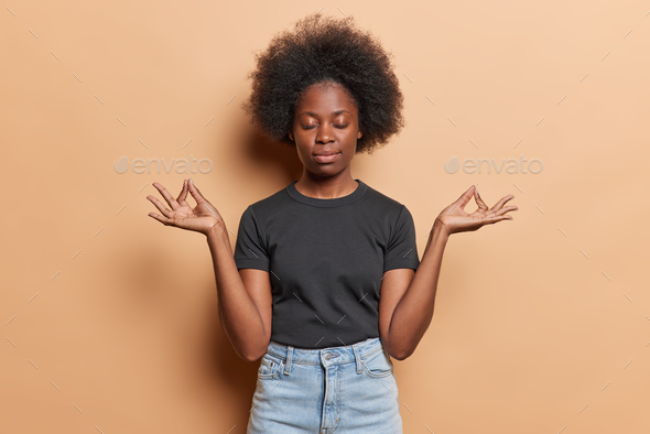 African American Woman Standing In A Yoga Position Isolated Stock