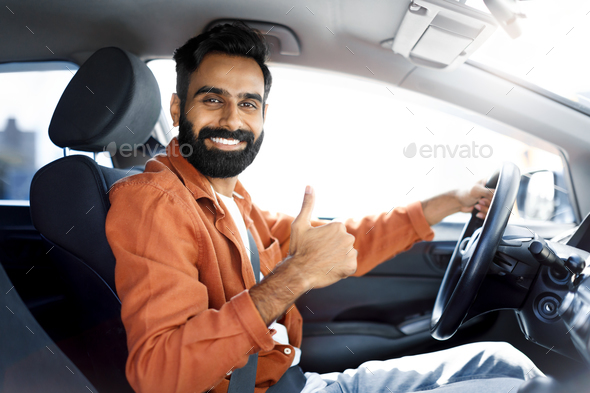 Happy Indian Driver Man Gesturing Thumbs Up Driving Car
