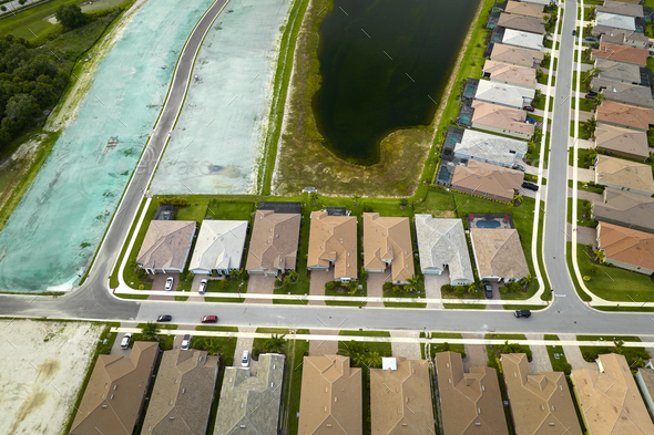 Aerial view of real estate development with tightly located family houses