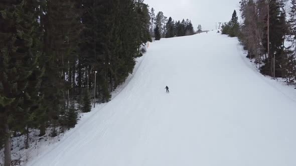 Aerial View of Downhill Skiing at Local Ski Resort. Ski Lift. Russia, Leningrdaskaya Oblast, Village