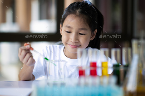 Girl scientist, fun science experiments for kids, science lab. Stock ...