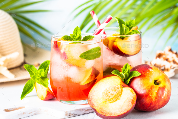 Peach cocktail, iced peach tea, fruit drink.