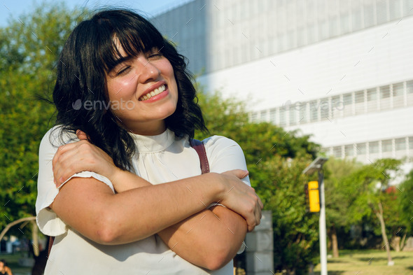young Venezuelan immigrant woman, very happy to be able to study at the university in Argentina