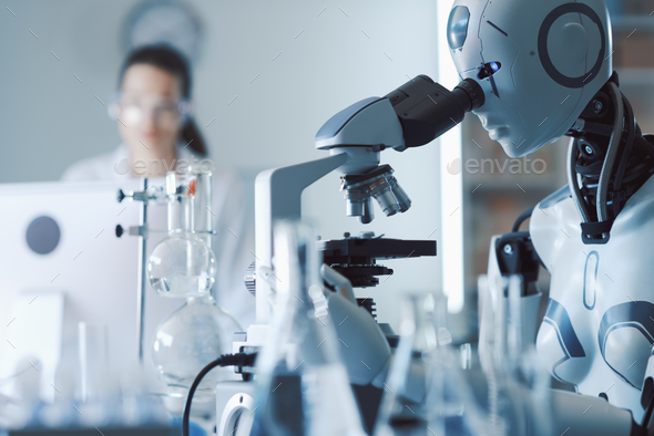 AI robot examining samples under a microscope - Stock Photo - Images