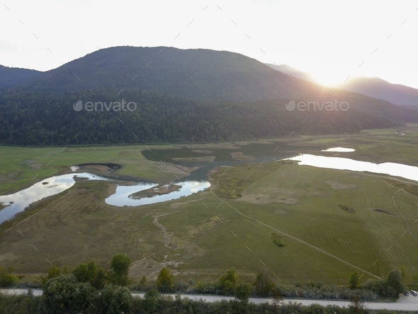 Lake Cerknica and green landscape in Cerknica Polje, Slovenia - Stock Photo - Images