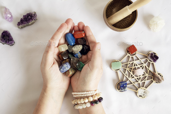 Healing chakra crystal grid therapy. Rituals with gemstones for wellness, healing, meditation