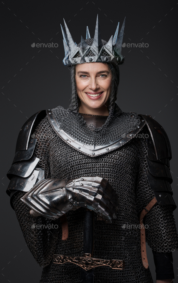 Stunning portrait of a female knight in medieval armor Stock Photo by
