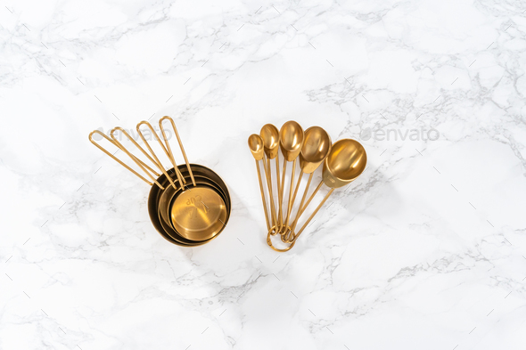 Measuring cups and spoons Stock Photo by arina-habich