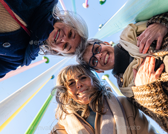 Elder group of women having fun, portrait of happy senior women taken from below