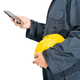 Worker standing in blue coverall holding hardhat and use smartphone - PhotoDune Item for Sale