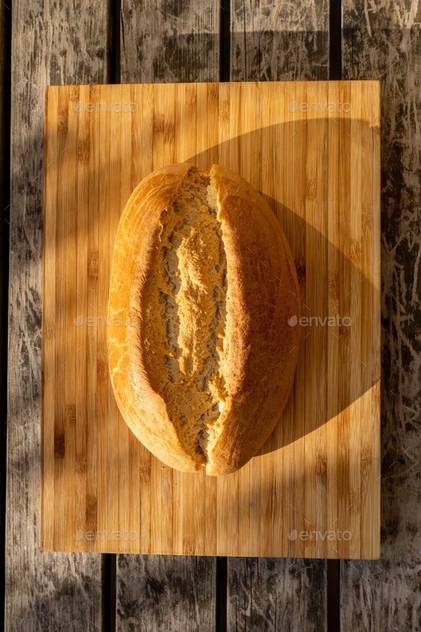 Sourdough bread slicing Stock Photo by grafvision