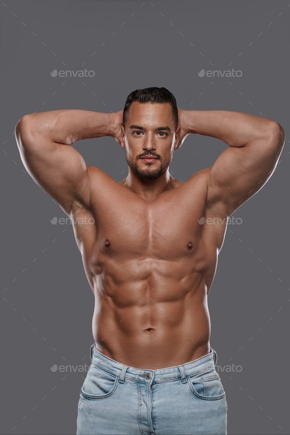Handsome and muscular male model with a chiseled physique Stock