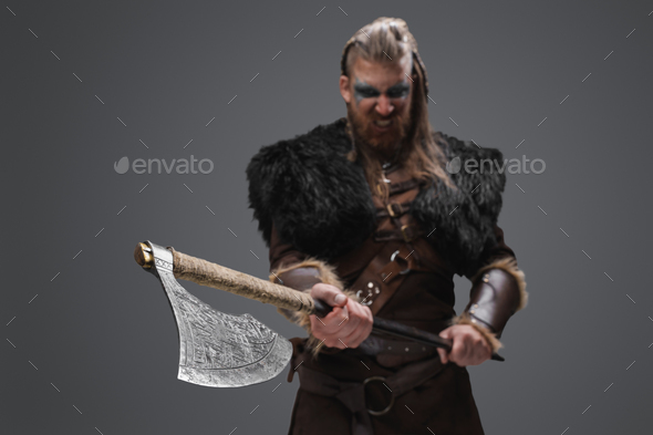 Evil viking from past with huge axe against grey background Stock Photo ...