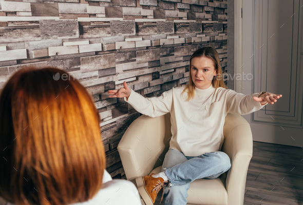 Psychotherapy consultation. Counselor talking to woman on meeting
