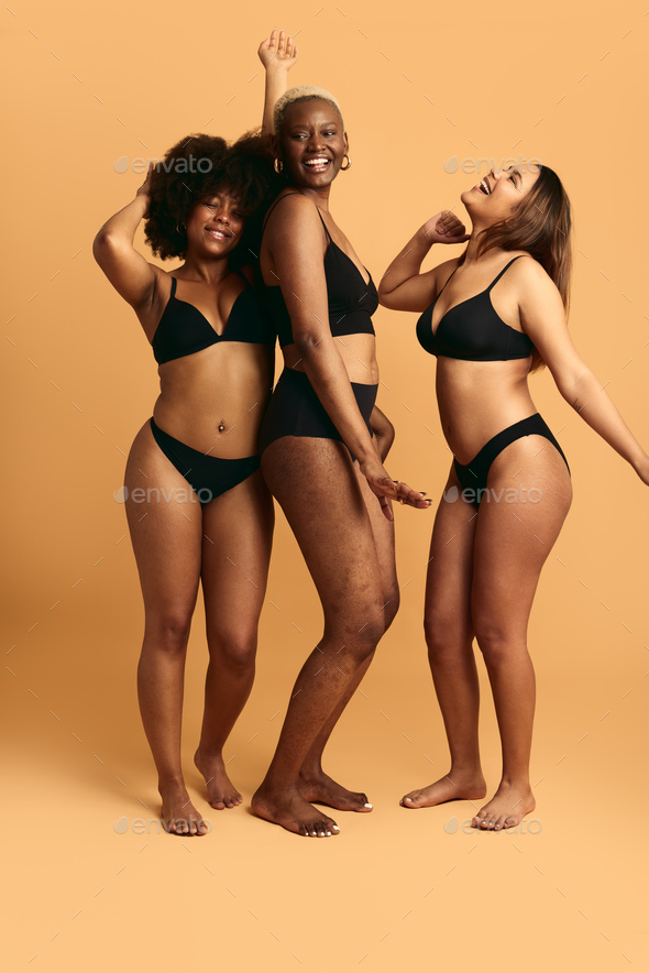 Plus size multiethnic girlfriends in underclothes indoors · Free Stock Photo