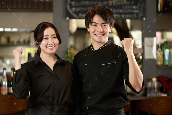 Asian men and women working in restaurants