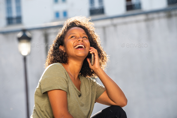 Close Up Beautiful Young Woman Laughing While Talking With Mobile Phone