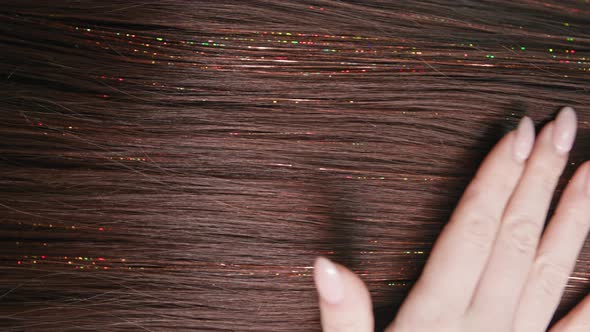 Hair Trends Closeup of Fashionable Hairstyle with Shiny Thread in Beautiful Hair Vertical Screen alt