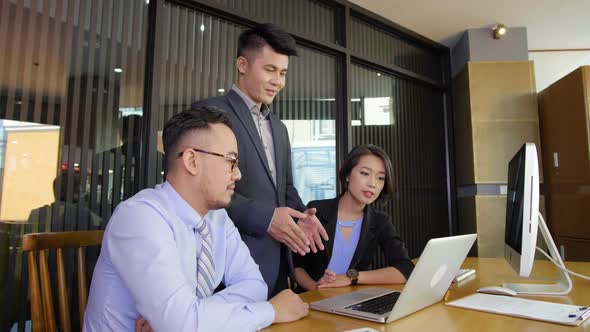 Three Colleagues Brainstorming alt